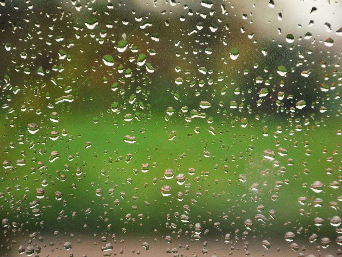 Condensation and fogging on a sliding glass door window pane